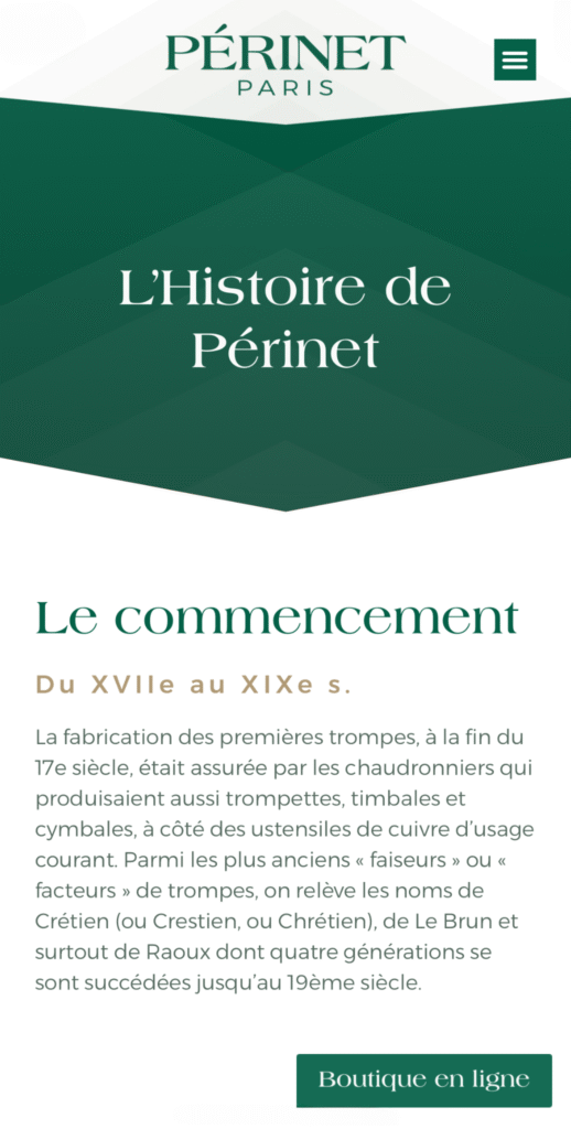 Capture d'écran de la page "L'Histoire de Périnet" sur mobile. Elle montre le titre "L'Histoire de Périnet" en grand, puis "Le commencement Du XVIIe au XIXe s." suivi d'un paragraphe expliquant l'origine de la fabrication des trompes et les noms des anciens "faiseurs".